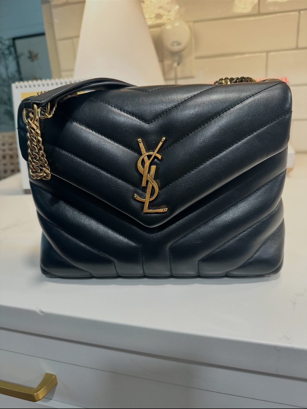 YSL Saint Laurent Loulou 
Black Quilted Leather